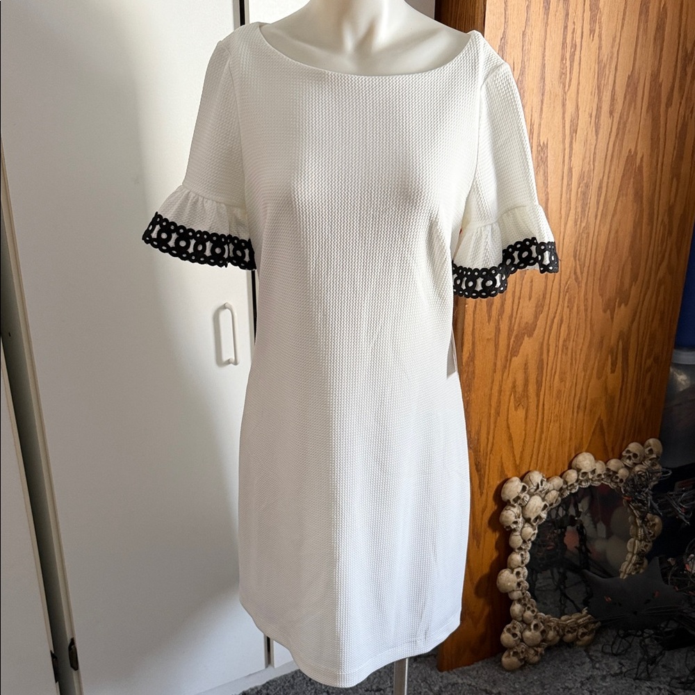 Elegant Lined White Dress with Black Embroidery